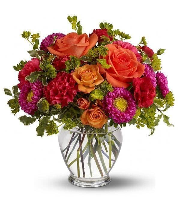 How Sweet It Is - orange roses , orange spray roses , hot pink matsumoto asters , hot pink mini carnations , vase arrangement