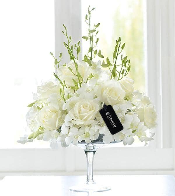 Luxury White Orchid and Rose Arrangement - Vase of white dendrobium orchids and large headed white roses