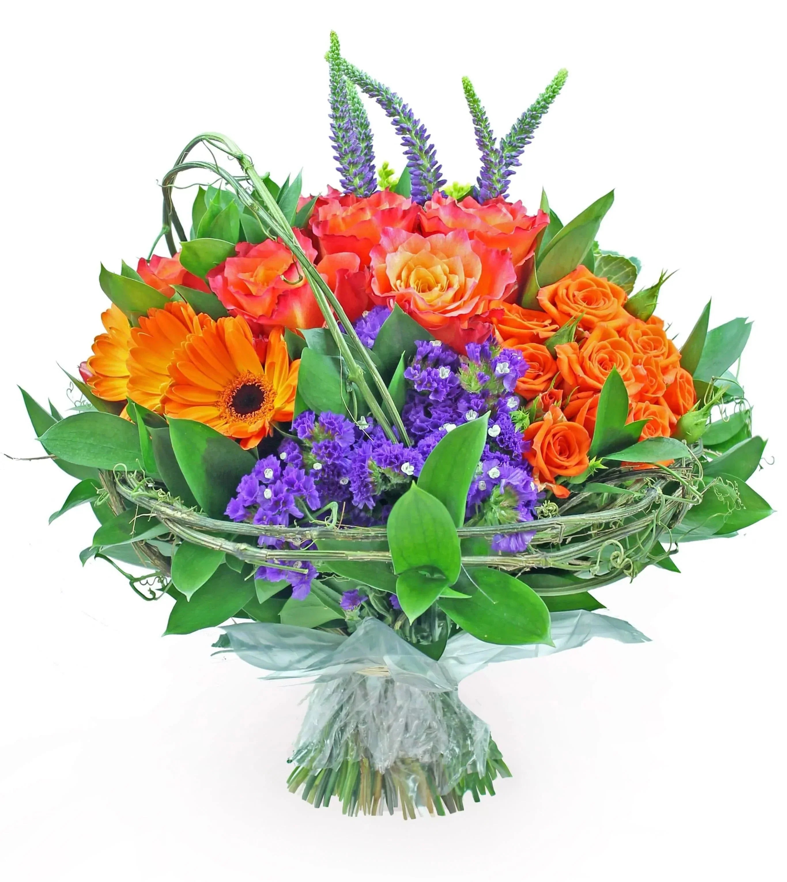 Mixed luxury bouquet in warm tones with gerberas, sinensis, roses, spray roses, veronicas, kale, achillea, hypericum and ruscus.